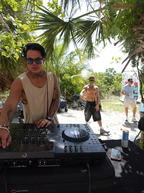 Leo Rojas playing an outdoor beach set